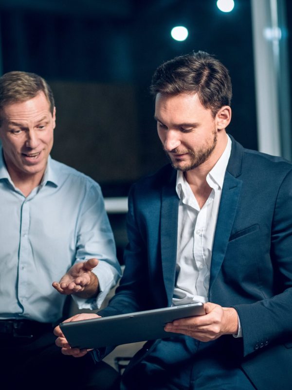Two executives are talking about leadership Two executives are talking about leadership
