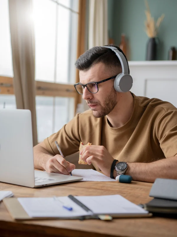 young-man-studying-library-using-laptop.webp young-man-studying-library-using-laptop.webp